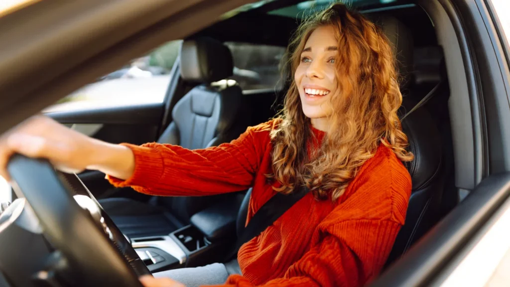 Woman driving her car with confidence